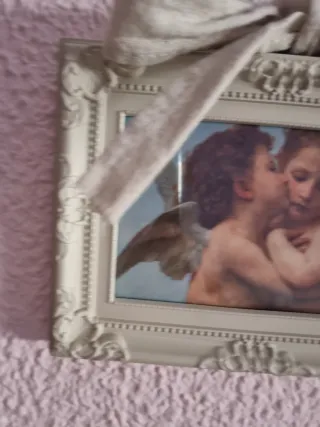 Dos marcos con la lámina de angelitos
