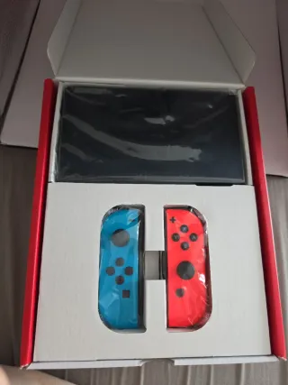 Nintendo Switch OLED + 5 Juegos COMO NUEVA
