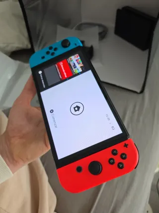 Nintendo Switch OLED + 5 Juegos COMO NUEVA