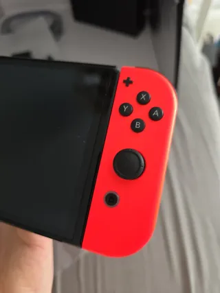 Nintendo Switch OLED + 5 Juegos COMO NUEVA