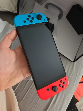 Nintendo Switch OLED + 5 Juegos COMO NUEVA