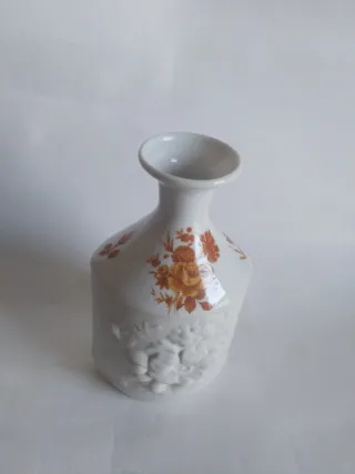 Jarrón de porcelana blanco y naranja
