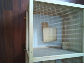 Jaula de madera para mascotas