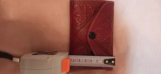 Cartera de piel burdeos sin estrenar