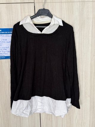 Jersey negro con camisa blanca