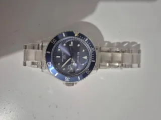 Reloj RCI Banque Azul y Plateado