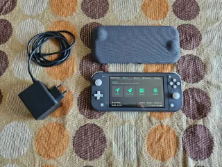 Nintendo Switch Lite + Cargador y Funda