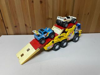 Camión Gozan con 2 coches