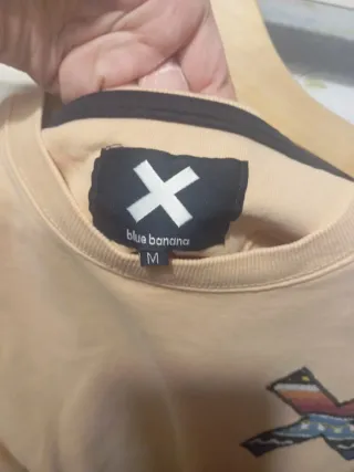 Sudadera color meloncoton blue Banana con estampa