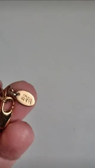 Collar cordón negro colgante dorado