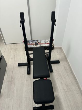 Banco musculación y juego de pesas