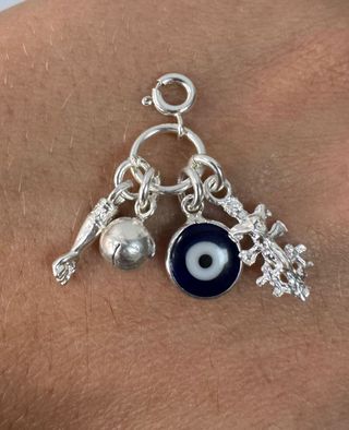 Plata de ley: Charm con amuletos