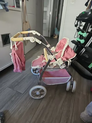 Carrito de muñecas rosa