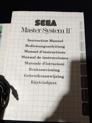 Sega Master System II - adaptador y manual
