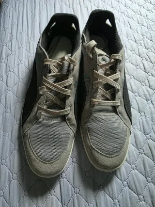 Zapatillas Puma grises y negras