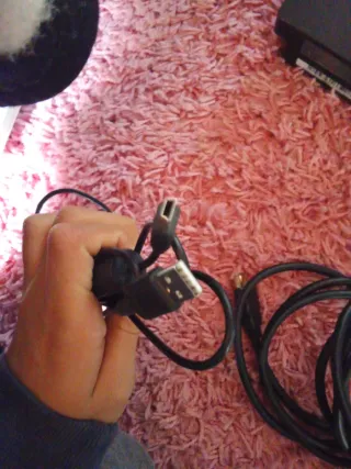 PS3 Slim Negra + 4 Juegos un mando cable de HDMI