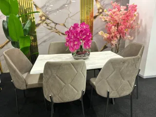 Mesa de comedor ovalada gris y sillas