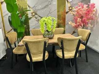 Mesa de comedor ovalada gris y sillas