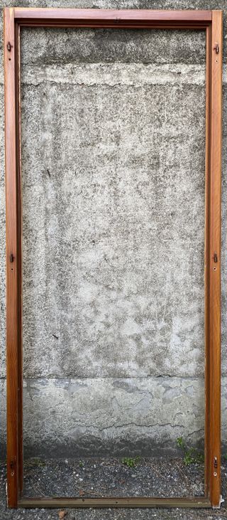 Finestrone a due ante in legno e vetro