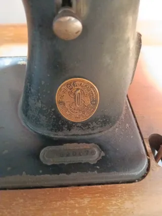 Máquina de coser Singer con mueble. Negociable
