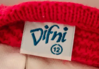 Conjunto de niña: vestido, blusa y bolera.