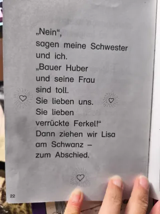 Zwei Ferkel stehen Kopf