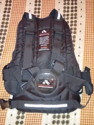 Cinturón seguridad moto niño