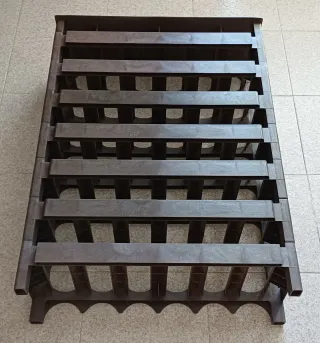 Botellero apilable de plástico