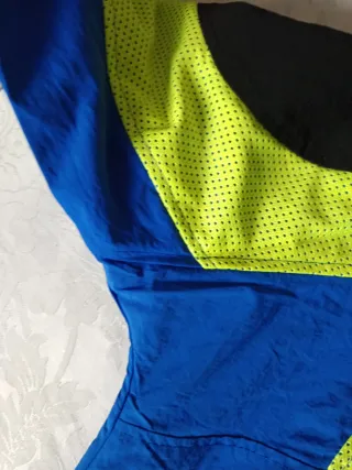 Chaqueta Corteiz Negra, Azul y Amarilla