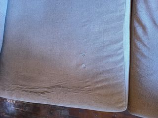 Sillón de tela beige