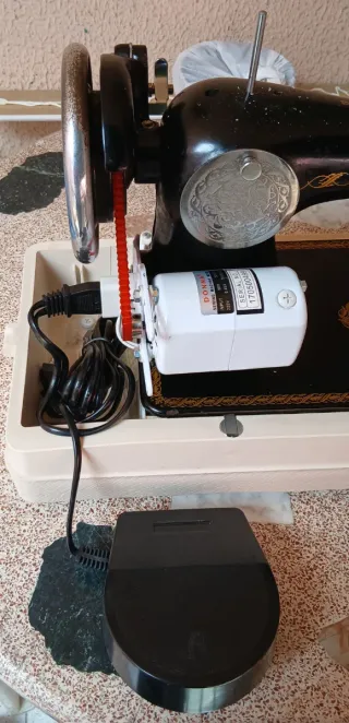 Máquina de coser Alfa