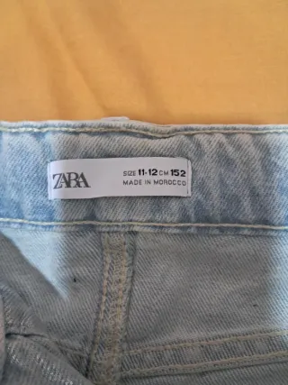 Falda Zara plateada metalizada midi