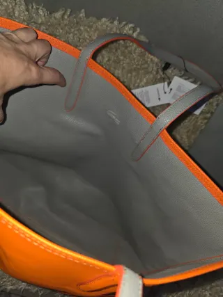 Bolso Lacoste reversible naranja e gris + neceser