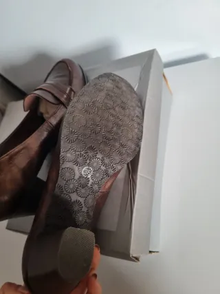 Mocasines de piel con tacón ABACK tono cobre.