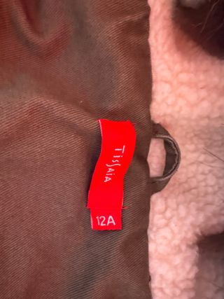 Abrigo verde con capucha y pelo