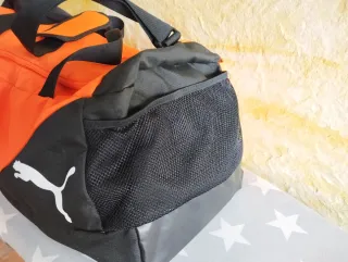 Bolsa de deporte Puma naranja y negra