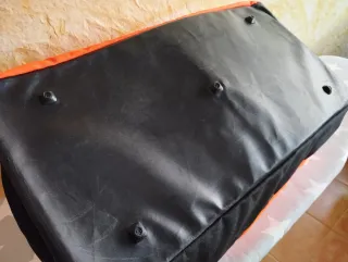 Bolsa de deporte Puma naranja y negra