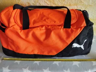 Bolsa de deporte Puma naranja y negra