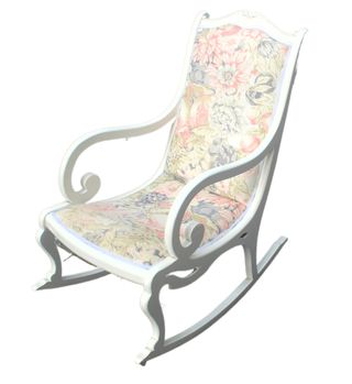 Mecedora de madera con tapizado floral
