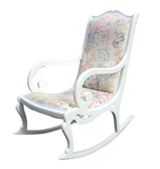 Mecedora de madera con tapizado floral