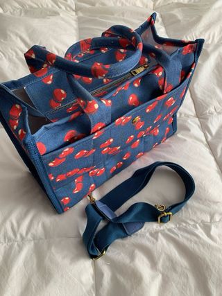 Bolso de mano con estampado de setas