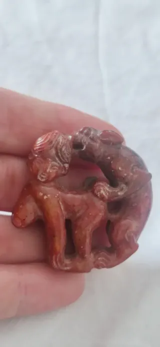 Amuleto de fertilidad tallado