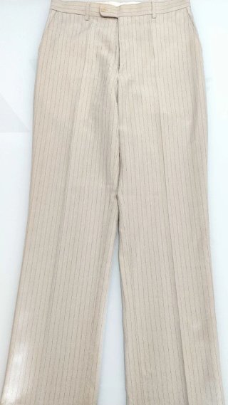 Traje chaqueta y pantalón en color beige, Talla 40