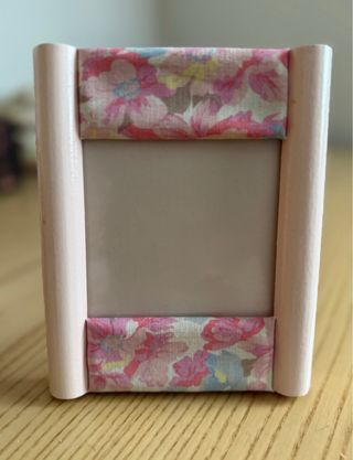 Portafoto rosa con fiori