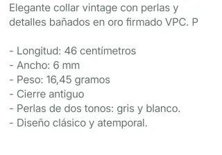 Collar de perlas grises y blancas .