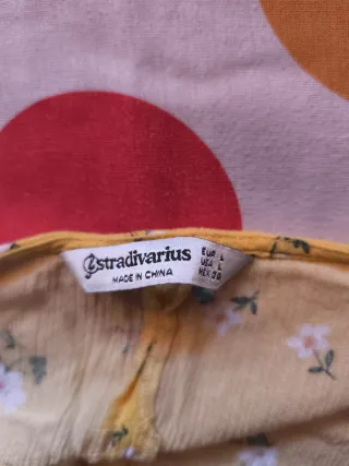 Top tirantes flores amarillo Stradivarius T.L