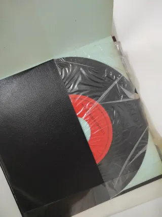 Libros con disco de vinilo sonido real.