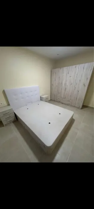 Cama canapé tapizada tela y madera
