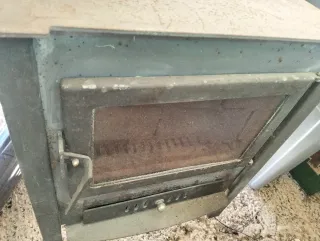 Estufa de leña metálica negra con salida de 150mm