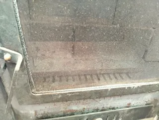 Estufa de leña metálica negra con salida de 150mm